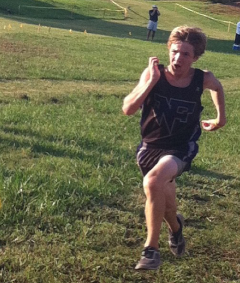 Freshman, Will Steinman, sprints the final stretch of the 5K cross-country race at Chestatee Middle School.