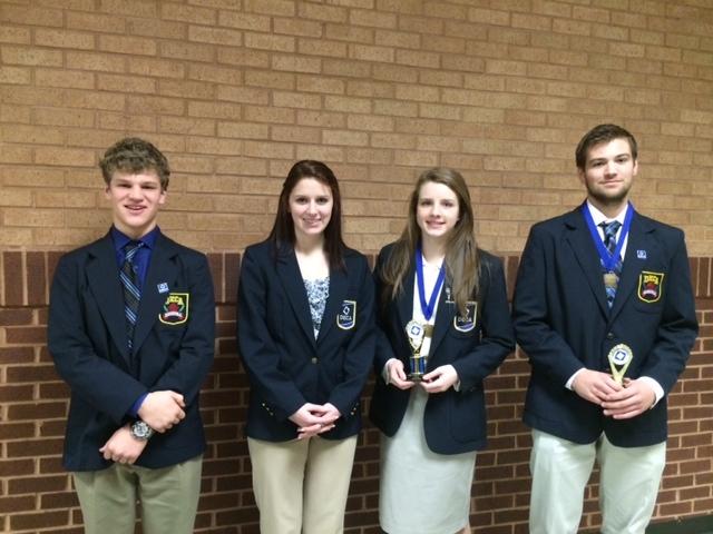 Standing left to right, Shaun Herock, Nicole Sullivan, Savannah Epperson, and Robbie Patrick are adorned in metals and honor with an accomplished vibe after their regional competition. 