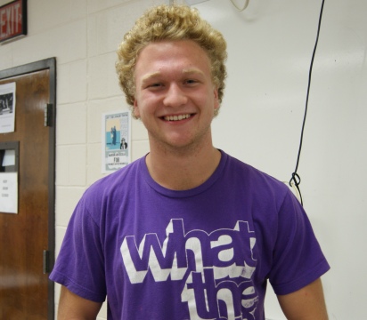 Josh Martin, nominee for homecoming king practices his winning smile.
