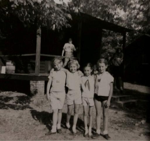 Jane Poe, second from the right, will always remember her days as a young woman at Girl Scout camp. “Associating with girls that shared my interests and also brought different opinions and talents to share during our meetings was so wonderful for me at that age,” Poe says. Camaraderie is just one of the skills she learned as a Girl Scout, and she still puts it to use daily. 