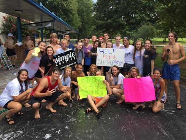 Simple Charity’s members helped wash cars while fighting global poverty with bright smiles. In hopes to reach their goal, they raised over $1200.  