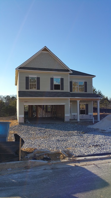 Above is a photo of one of the many homes which are being built across Forsyth County, attracting new homebuyers and businesses. However along with new recognition, the social and environmental effects of construction seem to be piling up.  