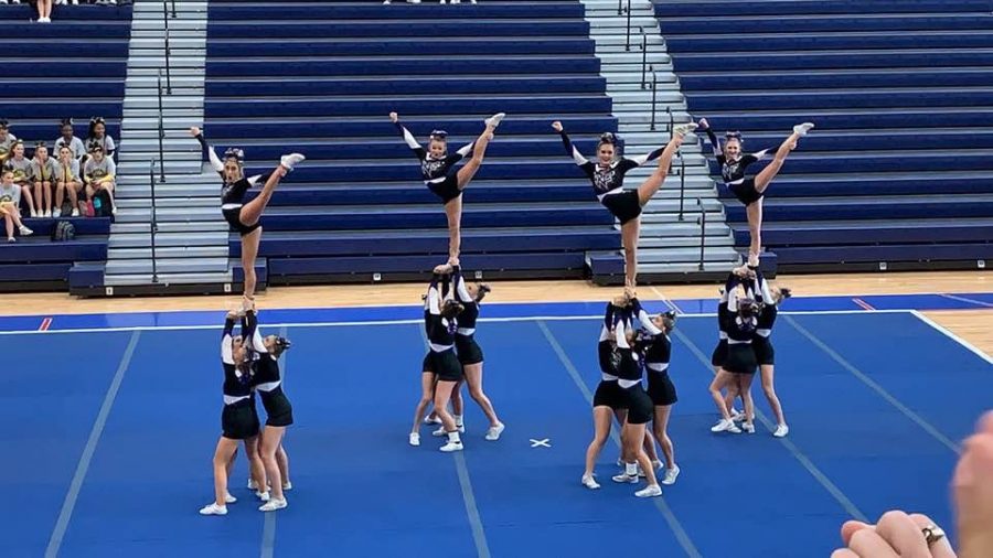  Competition cheer team during the stunt section at their first competition.
