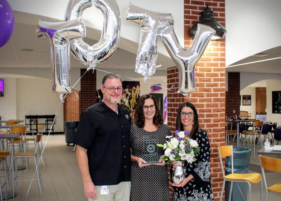 Mrs. Younghouse stands next to Mr. Jeff Cheney and Mrs. Kim Oliver; she has just received the Teacher of the Year award. Photo submitted by: North Forsyth High School Home Page 