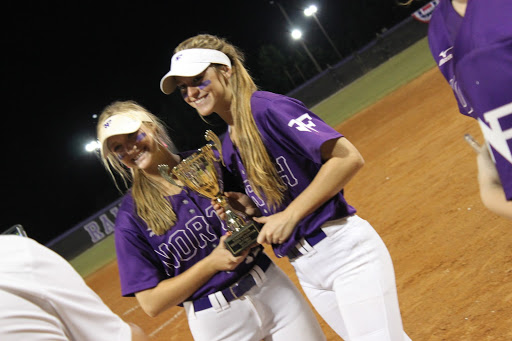 Anslee Anderson and Abby Martin hold the trophy