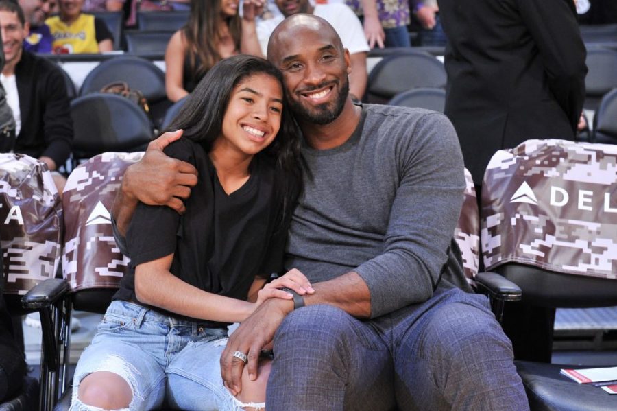  A famous picture of Kobe and Gianna Bryant at a basketball game is circulating the internet after the news of their passing.  Photo by DailySnark.com.