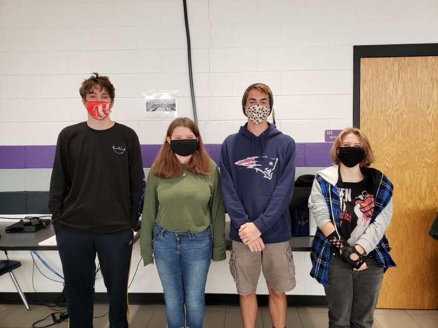 NFHS Raiders Andrew Barger (senior), Rachel Belisle (senior), Zackery Bethune (senior), and Jewel Reynolds (junior) are rocking their different styles of masks. Photo by: Cynda Allen.