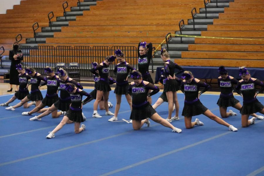 The beginning stance of the competition girls routine.