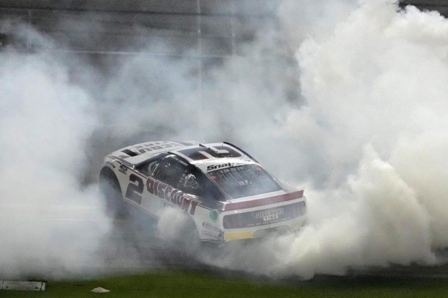 Austin Cindric celebrates his Daytona 500 victory in style with a burnout by the finish line. Photo by Haas Unlimited.