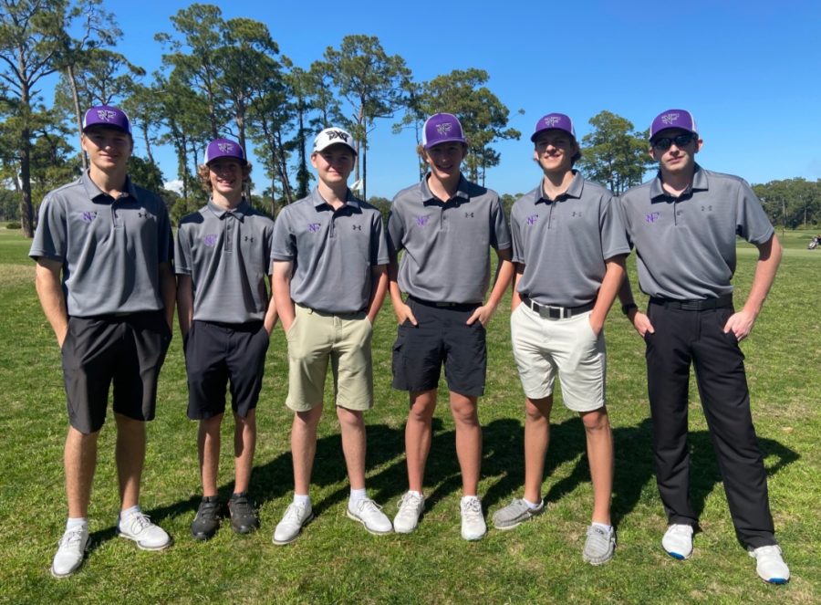 The North Forsyth golf team behind the 18th hole after a great tournament. Photo by Paige Mizer.