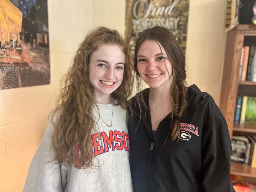 Seniors Abby Shoemake and Emmelyn Harrison wore College Merch (Photo by Sarah Treusch).