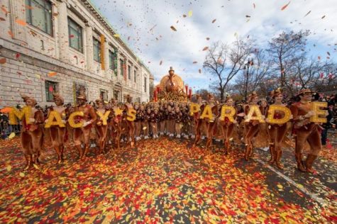 Macy’s celebrating their annual Thanksgiving parade in crowded streets. Photo by: Macys Thanksgiving Day Parade