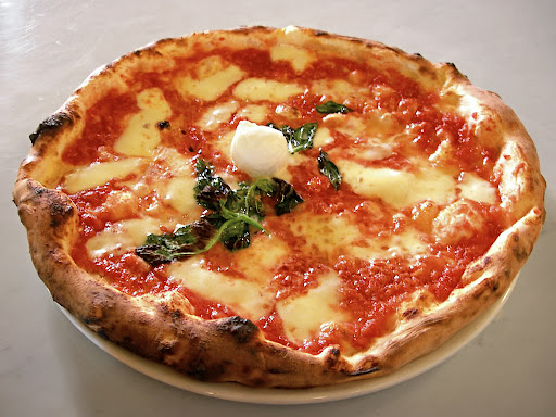 Caption: A very soup-looking pizza.
Photo by Wikipedia
