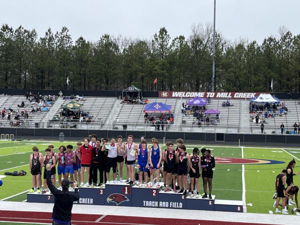 Raiders 4x800 Team Stands Atop Podium at Mill Creek
