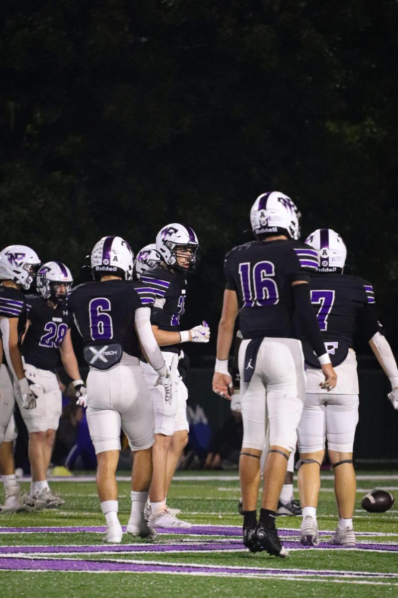 Raider defense huddles up after huge 3rd down stop.