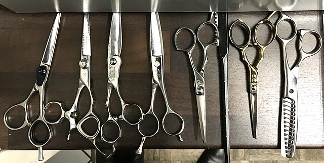 An assortment of professional hair scissors.