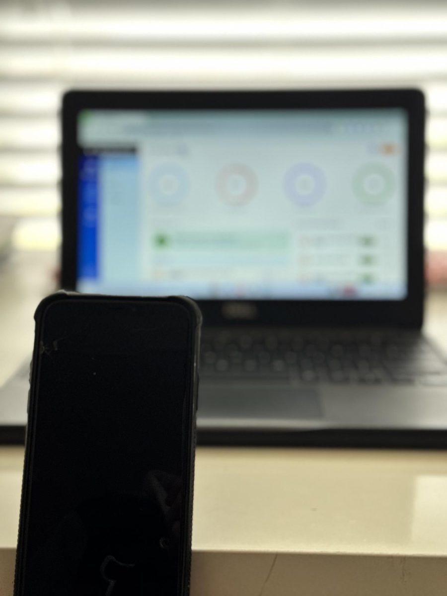 Many students think they can get away with cheating by hiding their phones in front of their computers.