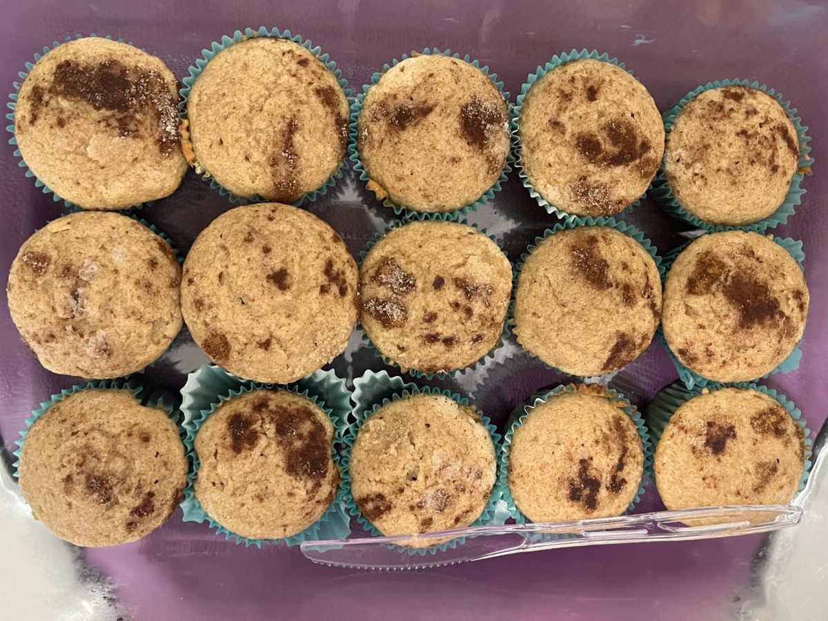 An array of cinnamon muffins waits to be devoured.