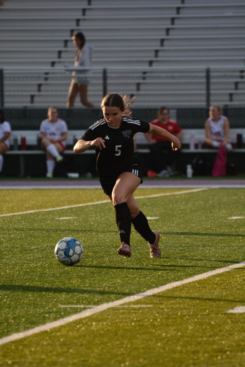 North’s #5, Mia Fowler, chases after the ball.