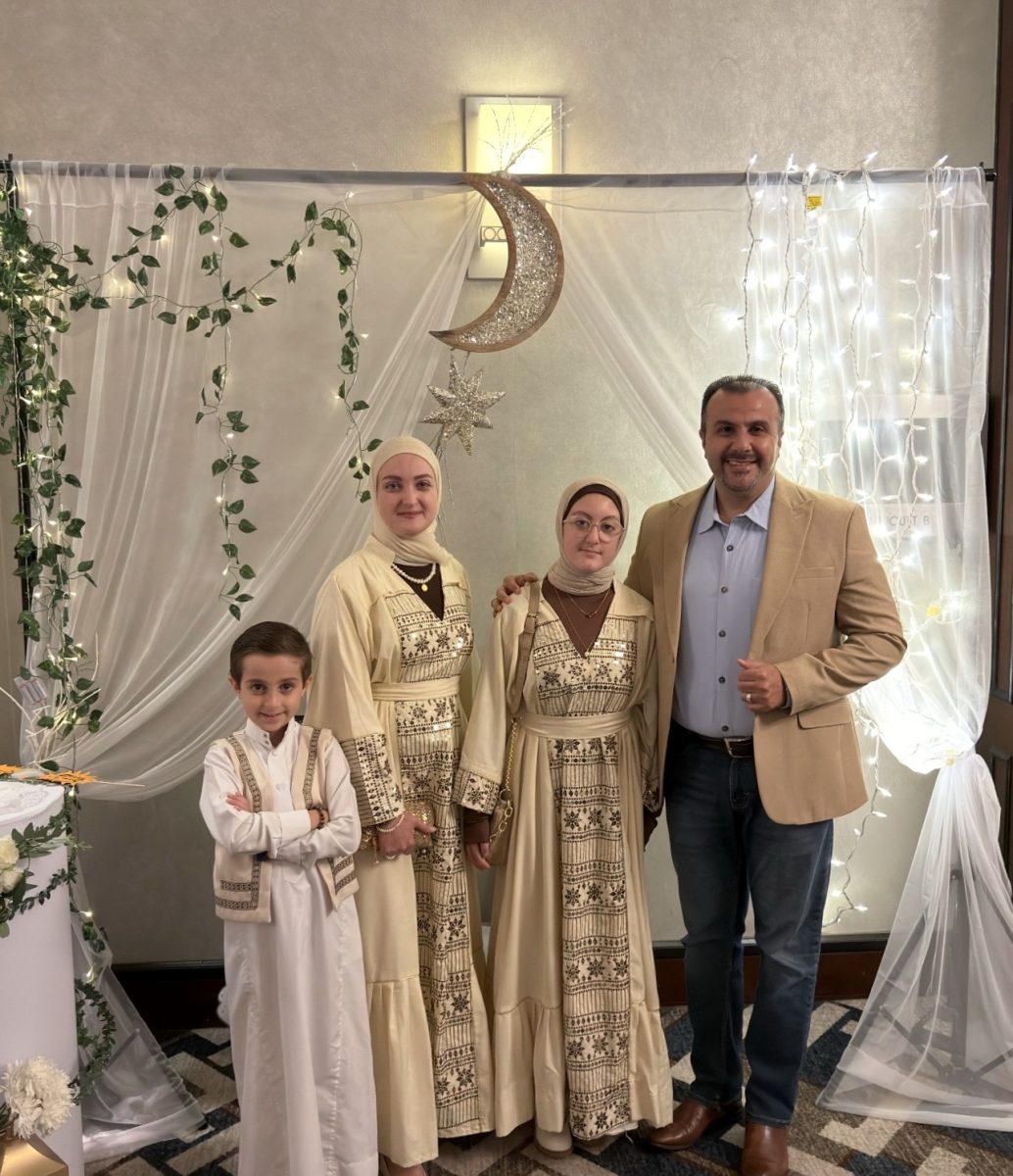 My family and I dressed in traditional clothing for Eid Al-Fitr.