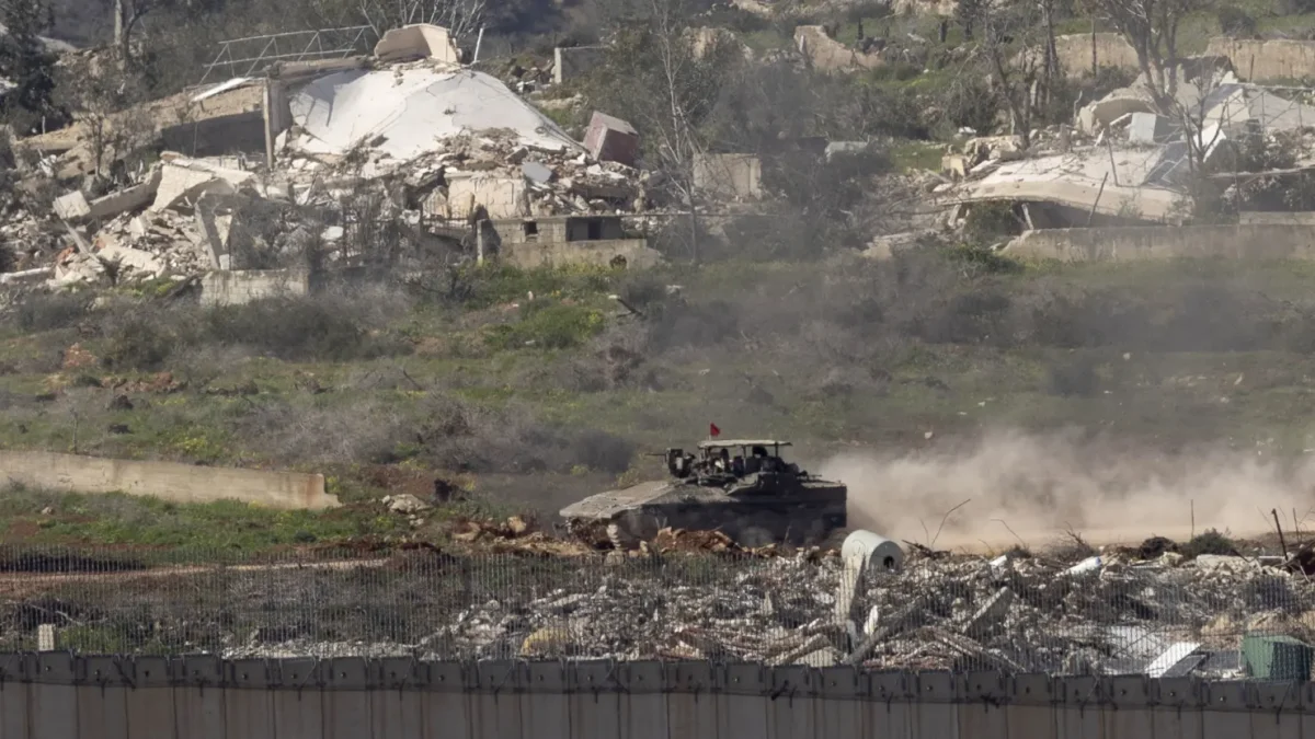 An Israeli tank stationed near the Israel border getting ready for an attack.